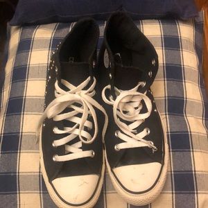 Black Converse with silver beads on outside of shoe